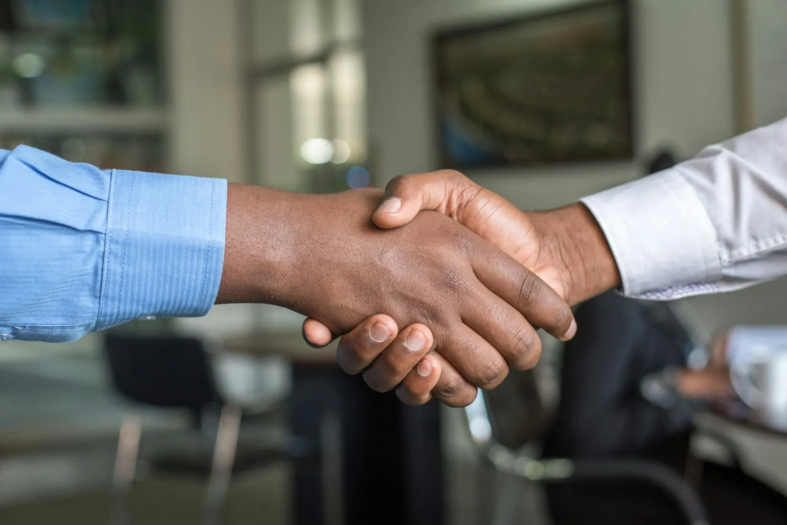 Handshake in a warm setting